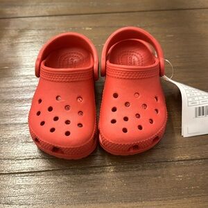 Brand New kids crocs in red size 7